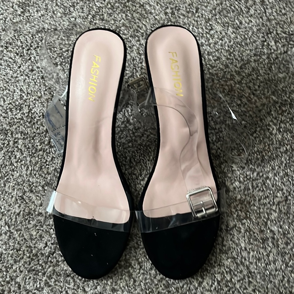 Size 8.5 clear heels. Worn a handful of times but we’ll taken care of.